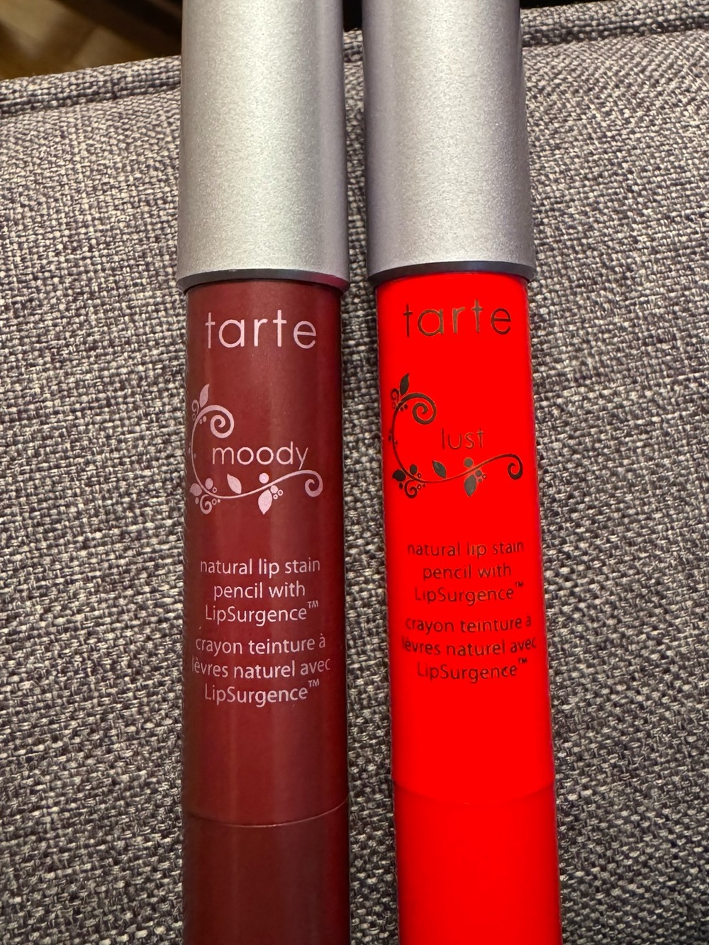 tarte Natural Lip Stain Pencils — Moody (deep berry) & Lust (vibrant red)